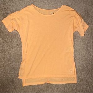 women’s orange nike yoga shirt